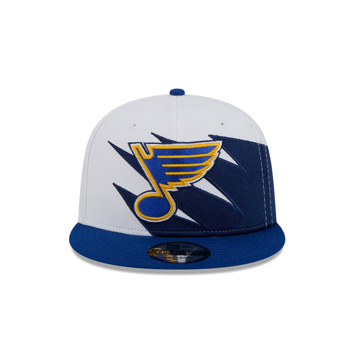 ST. LOUIS BLUES NEW ERA 9FIFTY JAGGED EDGE SNAPBACK - WHITE/ROYAL Hat New Era